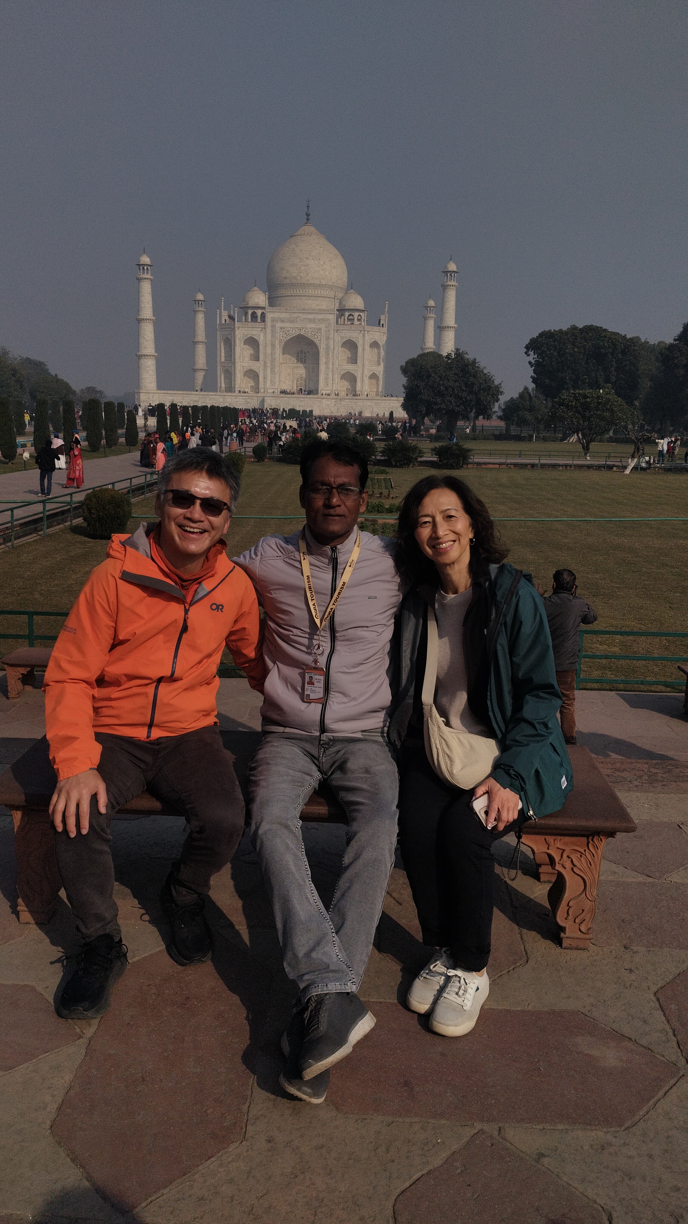 Mr. Verma with tourists smiling
